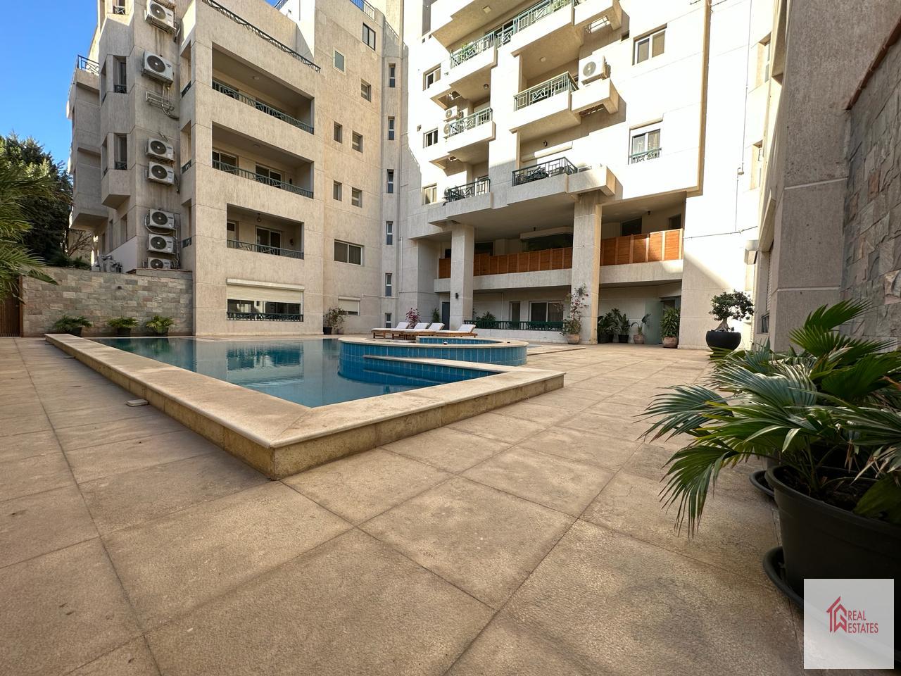 Planta baja 2 dormitorios 2 baños alquiler maadi Sarayat piscina compartida El Cairo Egipto