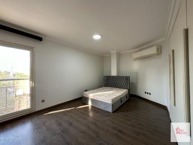 Duplex apartment first floor 3 bedrooms 3 bathrooms living room 4 balconies shared swimming pool maadi Sarayate Cairo Egypt